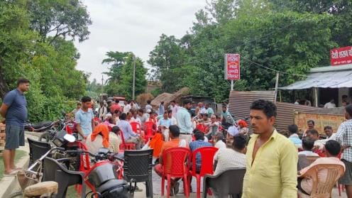 They blocked the road and sat on chairs and said- get the liquor shop removed from near the temple