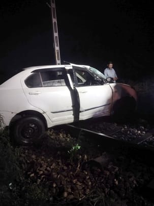 Car stuck on railway track, accident averted due to emergency brake