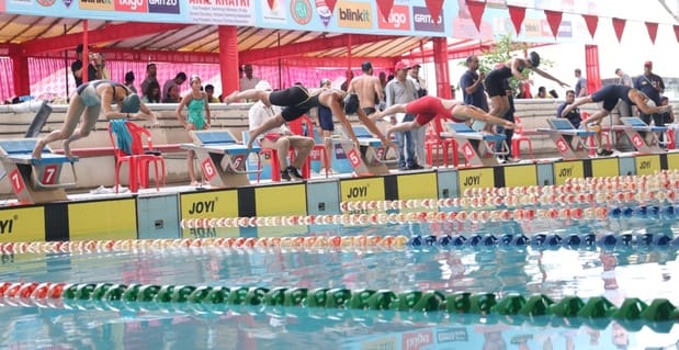 Jhajjar boys and Gurugram girls dominated the state swimming competition
