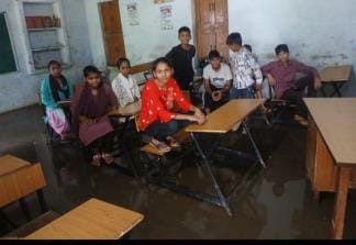 Due to heavy rain, water reached the dual desk of the school, swings also got submerged