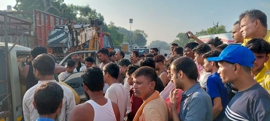 Driver and helper injured in road accident