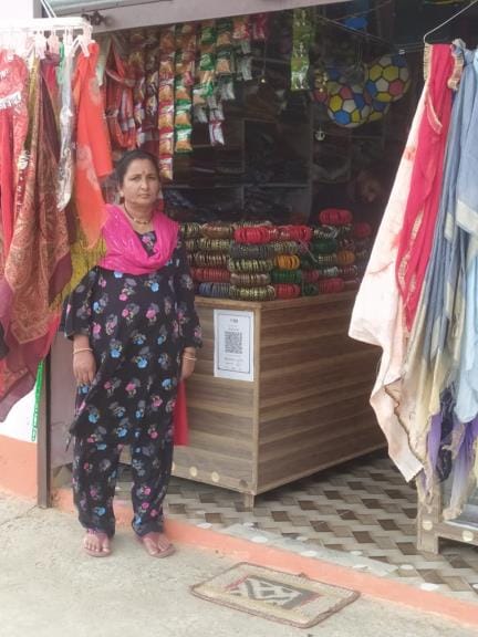 Geeta's life improved with beauty parlor and tailoring venture