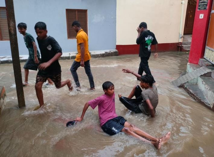 Rain-soaked streets and alleys, people troubled