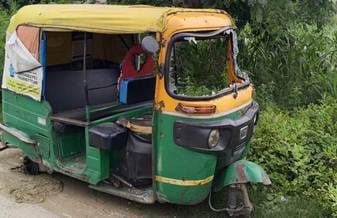 The three wheeler is standing on the track of the drain for three days