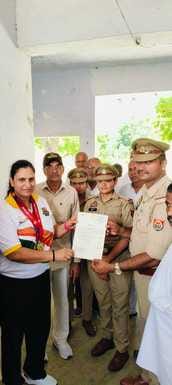 Female constable won gold and silver in head wrestling