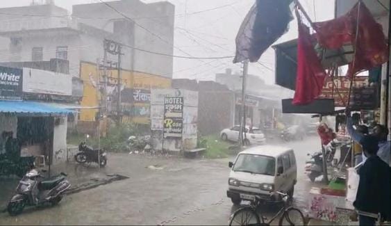 The weather is pleasant due to drizzling rain, relief from the humid heat