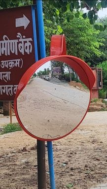 Road safety mirrors should be installed at main intersections and turns