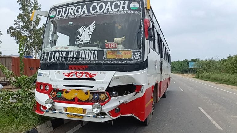 Tractor and private bus collided
