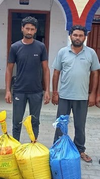 Two arrested for pouring water on ration