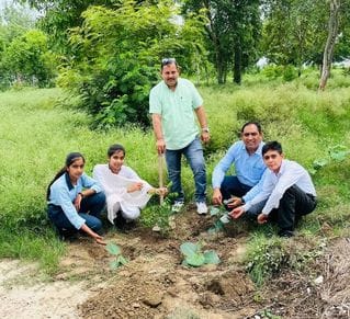 Volunteers gave the message of environmental protection by planting trees