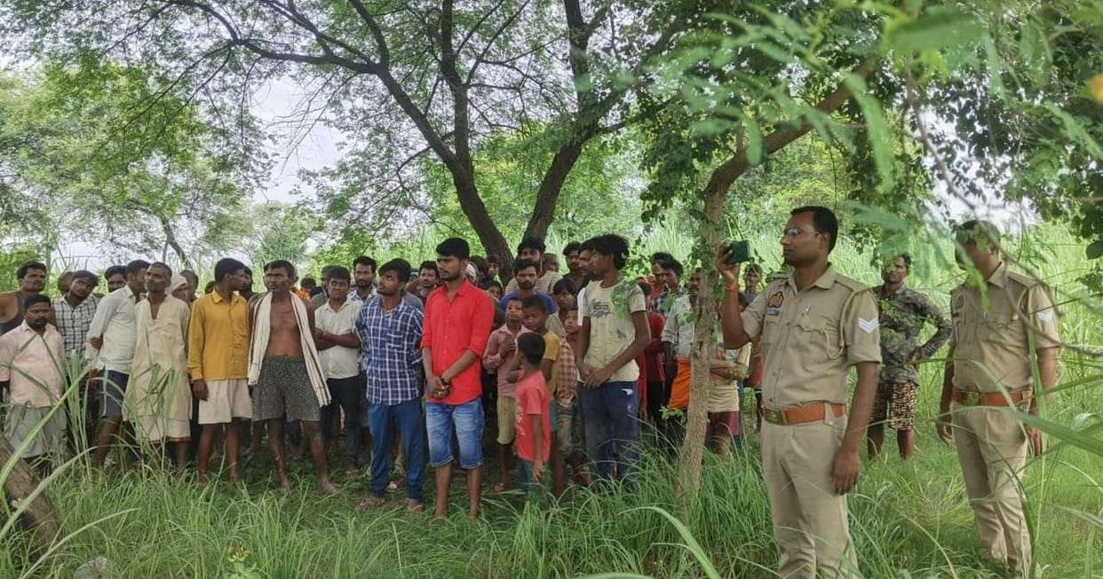 The body of a young man was found hanging from a tree, 'Anita' was written on his hand