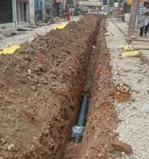 The road is not yet fully built, the water corporation has dug it up