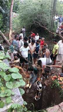 The bull that fell into the well was taken out after five hours of hard work