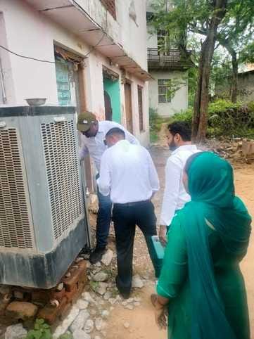 Health workers sprayed anti-larvae medicine