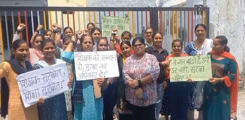 Protest expressed over murder of principal