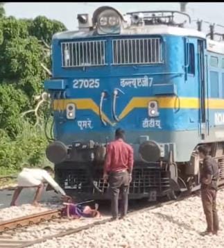 A woman was hit by a freight train while crossing the tracks