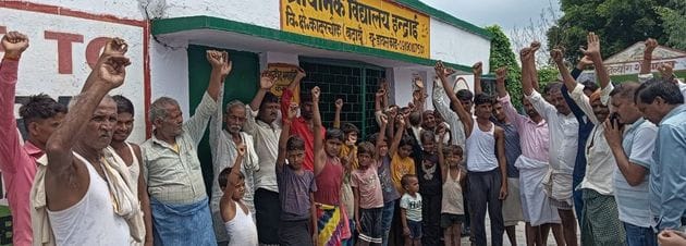 Villagers protest against the merger of schools