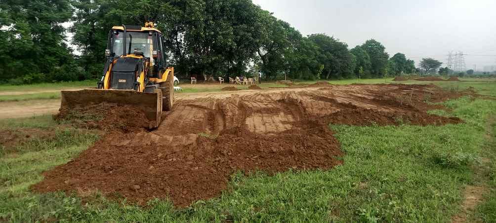 Bulldozer runs on construction in illegally developed colony