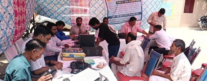 Crowd of consumers gathered in electricity solution camps
