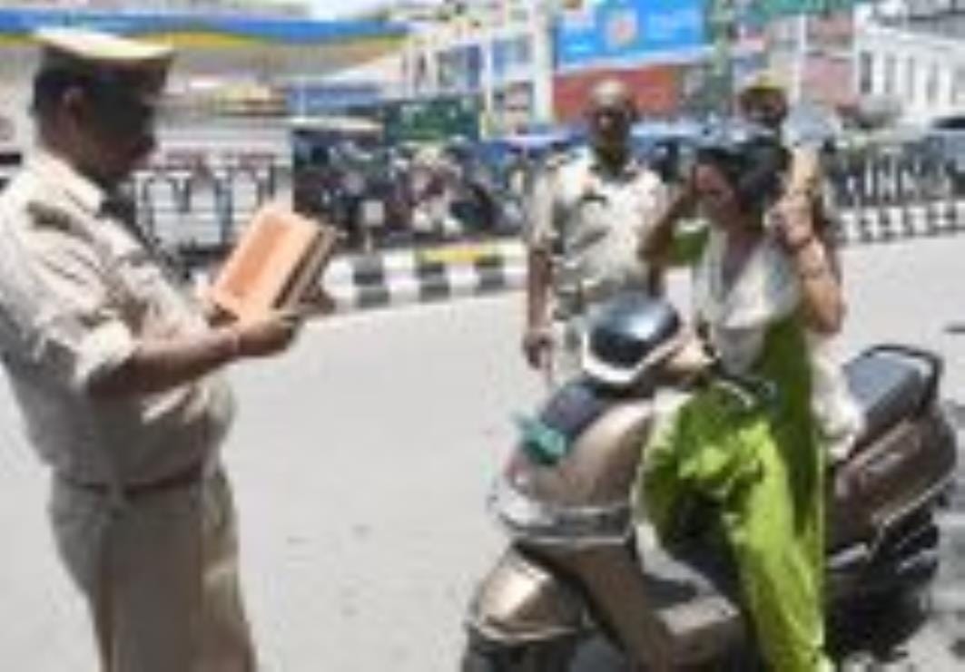 Neither the lawyer's argument worked, nor the police took note of the bike rider's arrogance, challan was issued to everyone
