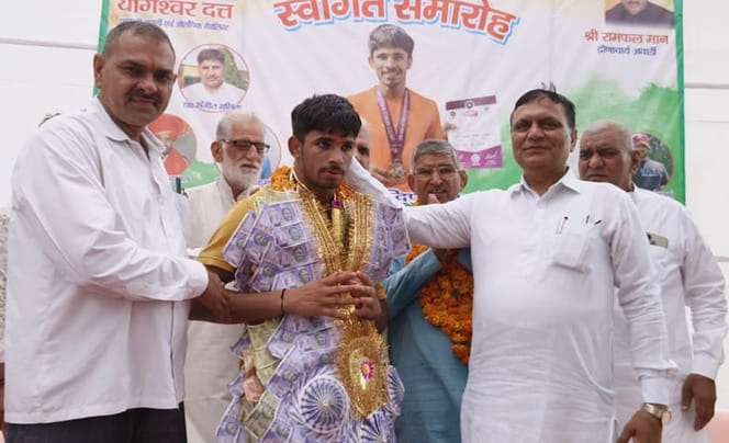 Gold medal winner Rohit Mann honored