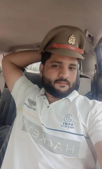 Photo of a youth wearing a P-cap and holding a wireless device goes viral; arrested