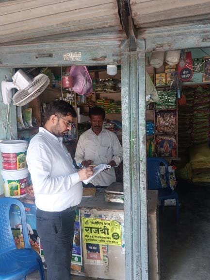 District Agriculture Officer inspecting the fertilizer shop in Dhanghata