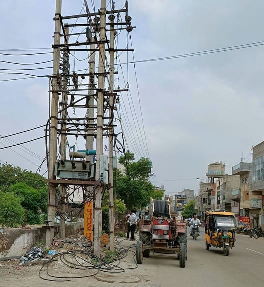 Work of changing wires and installing poles went on in the city