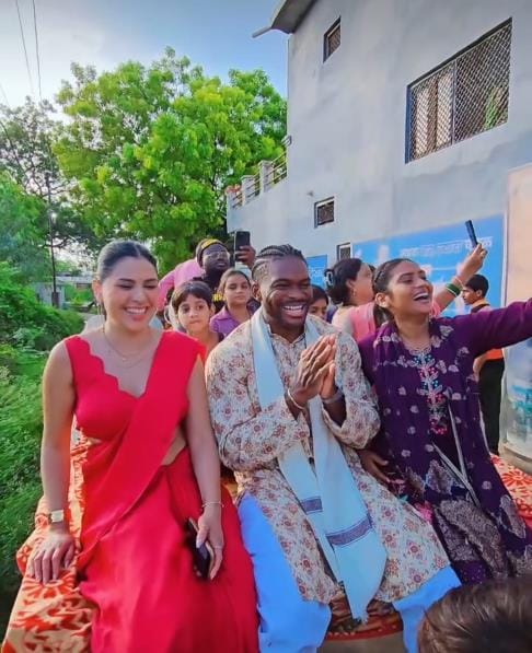 Guests from America who came to visit Indian villages took a bullock cart ride