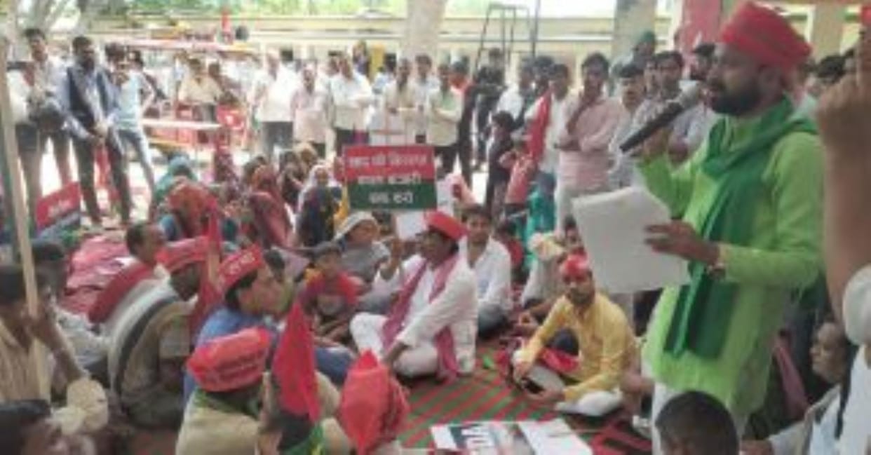 MLA staged a sit-in for compensation to flood victims