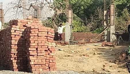Report filed against 22 people including former chairman for occupying land