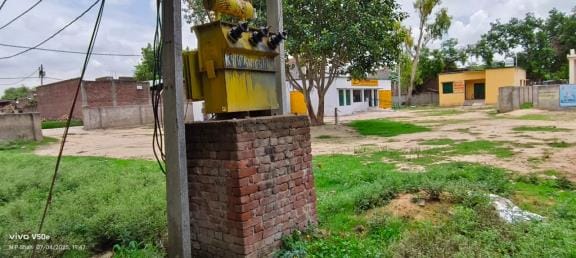 Transformers placed in schools, wires protruding from above