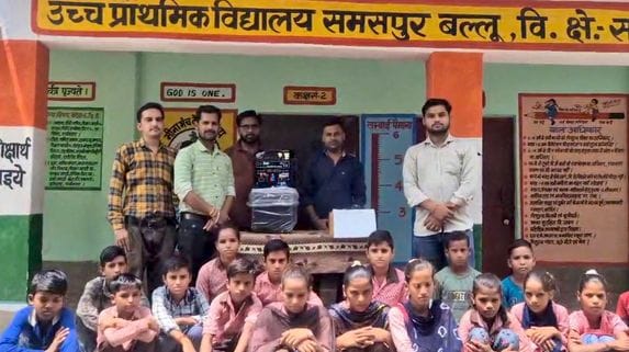 The bank presented a sound system to the school and distributed sweets