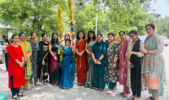 The students sang Teej songs after dancing
