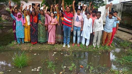 Villagers angry over waterlogging in Neta Nagar staged a protest