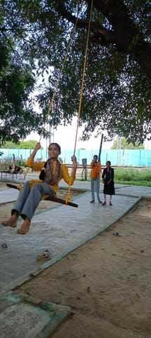 Teenage girls and women sang songs of Sawan while swinging