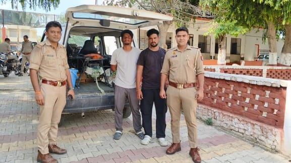 Villagers surrounded the youths who were spraying nano urea using drones