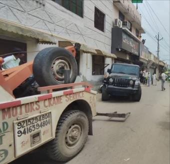 Sisters riding a scooter injured after being hit by a Thar