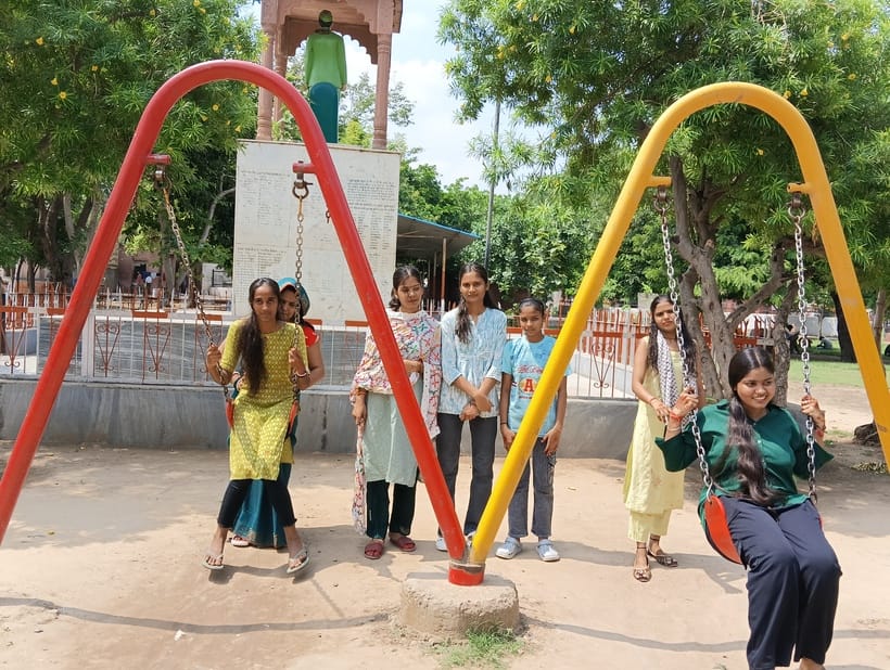 Children and women enjoyed swinging in the park and also flew kites