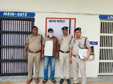 Associate of accused of shooting at singer arrested