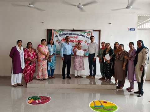 Rangoli, poster and mehndi competition organized on Teej festival