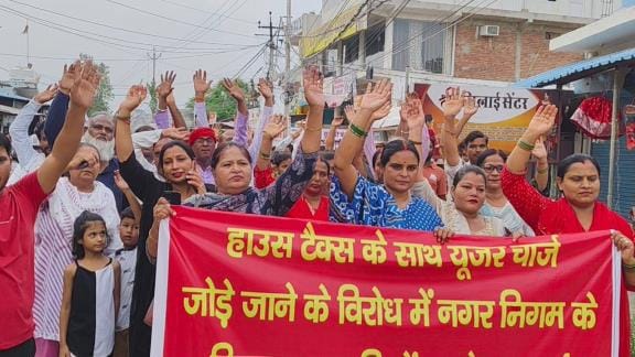 Protest against adding user charge in house tax, march taken out