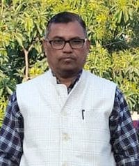 The body of Khadi Village Industries Officer was found hanging from a noose on a mango tree