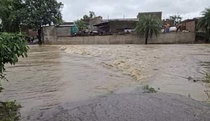 Sagar rain: Pregnant woman swept away in overflowing drain, was crossing bridge with husband on bike