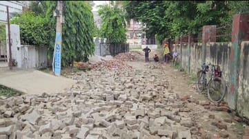 The issue of drain construction was raised in Kalindi Colony