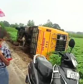 A private school bus overturned in a field from a connecting road in Ispur, two children injured