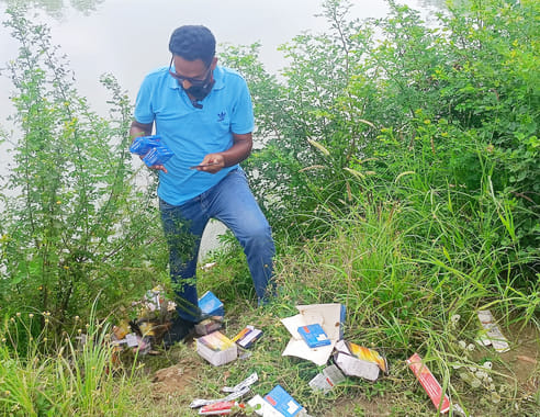 Expired medicines and medical waste found in the open near the canal