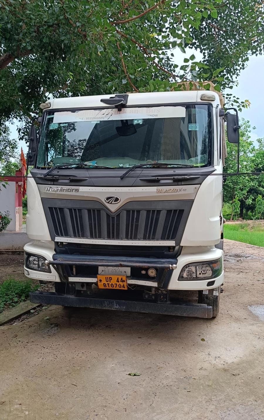 Bike rider dies after colliding with truck, teacher injured