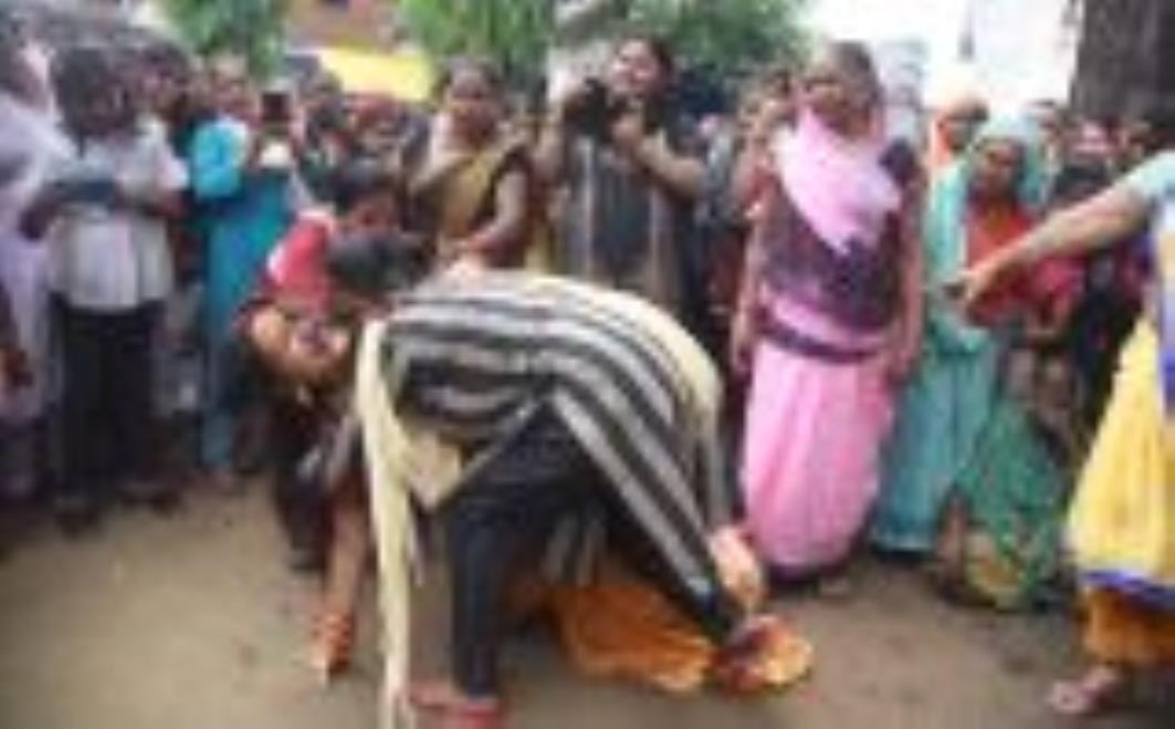 Women entered the arena wearing saris and showed their skills