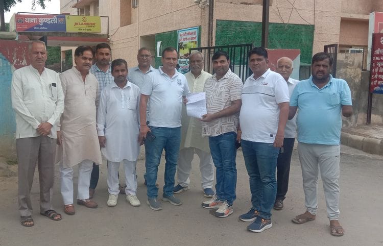 Accused of threatening the Sarpanch of Khatkad